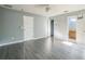 Spacious bedroom with new flooring and multiple doorways leading to closet and bathroom at 16449 Cedar Crest Dr, Orlando, FL 32828
