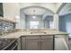 Modern kitchen with sleek appliances, granite countertops, and a breakfast bar for casual dining at 16449 Cedar Crest Dr, Orlando, FL 32828