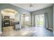 Open-concept kitchen with stainless steel appliances and seamless access to the backyard at 16449 Cedar Crest Dr, Orlando, FL 32828