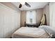Bedroom with bed, instruments, view of the outside, and closet storage at 1649 W Waycross Cir, Deltona, FL 32725