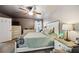 Comfortable bedroom with neutral paint, multiple dressers, and an exterior view at 1649 W Waycross Cir, Deltona, FL 32725