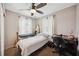Bedroom featuring a bed, writing desk, instruments, and natural lighting at 1649 W Waycross Cir, Deltona, FL 32725