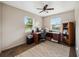 Carpeted office space with desk, chair, rug, and built-in bookshelf at 1649 W Waycross Cir, Deltona, FL 32725