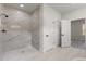 Stylish walk-in shower with marble tiling and multiple closets at 17477 Sw 41St Cir, Ocala, FL 34473