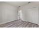 Bedroom featuring a closet, wood floors, and a view to another room at 17477 Sw 41St Cir, Ocala, FL 34473