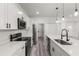 Modern kitchen with stainless steel appliances, quartz countertops, and a kitchen island at 17477 Sw 41St Cir, Ocala, FL 34473