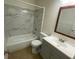 Bathroom featuring a vanity sink, mirror, bathtub, and toilet at 211 Valencia Rd, Debary, FL 32713