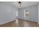 Bright living room with plenty of light, fresh paint, and new flooring at 2255 Tealwood Cir, Tavares, FL 32778