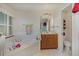 Bathroom features a garden tub, single vanity, and separate toilet room at 2283 Knollwood Dr, Leesburg, FL 34748