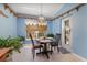 Cozy breakfast nook with blue walls and light wood floors at 2283 Knollwood Dr, Leesburg, FL 34748