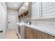 Functional laundry room with washer, dryer, cabinets, and countertop space at 23538 Valderama Ln, Sorrento, FL 32776