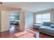 Spacious living room featuring comfortable seating, natural light, and a view into a connected living room at 2406 Blossomwood Dr, Oviedo, FL 32765