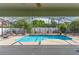 Inviting screened-in pool area with clear blue water, a sunbathing area, and nice plants at 2406 Blossomwood Dr, Oviedo, FL 32765