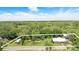 Landscaped property with a comfortable home, above-ground pool, and a variety of recreational vehicles at 255 Belinda Dr, Deland, FL 32720