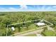Expansive property featuring a well-maintained home, recreational vehicles, and an inviting above-ground pool at 255 Belinda Dr, Deland, FL 32720