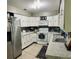 Well-appointed kitchen with white cabinets, modern appliances, and ample counter space at 255 Belinda Dr, Deland, FL 32720