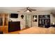Spacious main bedroom features a ceiling fan, closet, and an ensuite bathroom entrance at 255 Belinda Dr, Deland, FL 32720