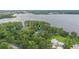 A lakefront property with mature trees and green lawns, with a pin denoting the property location at 2652 Lake Howell Ln, Winter Park, FL 32792