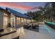 Expansive outdoor deck featuring ample seating and sunset views at 2652 Lake Howell Ln, Winter Park, FL 32792