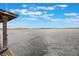 Scenic lake view from the edge of a dock, showcasing the waterfront at 2652 Lake Howell Ln, Winter Park, FL 32792