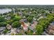 Aerial view of home in established neighborhood with mature trees and convenient access to local amenities at 2971 Cayman Way, Orlando, FL 32812