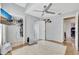 Neutral bedroom with a ceiling fan, with doors leading to closet space and adjoining rooms at 2971 Cayman Way, Orlando, FL 32812