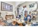 Open-concept living area with stylish decor, stairway, and bright natural light at 2971 Cayman Way, Orlando, FL 32812