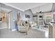 Elegant living room with luxury furniture, high ceilings, and bright natural light at 2971 Cayman Way, Orlando, FL 32812
