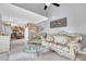Open floor plan with views of the kitchen, high ceilings and classic-styled furnishings at 2971 Cayman Way, Orlando, FL 32812
