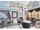 Elegant living room with fireplace, large windows, and stylish decor at 2971 Cayman Way, Orlando, FL 32812