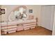 Spacious bedroom with ample closet space and a unique vanity with heart shaped mirror at 3012 S Semoran Blvd # S, Orlando, FL 32822