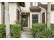 Charming condo front entrance features well-maintained landscaping and inviting doorway at 3012 S Semoran Blvd # S, Orlando, FL 32822