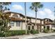 Inviting two-story condo featuring lush landscaping and beautiful curb appeal at 3012 S Semoran Blvd # S, Orlando, FL 32822