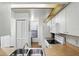 Efficient kitchen with modern appliances, ample cabinets, and functional layout at 3012 S Semoran Blvd # S, Orlando, FL 32822