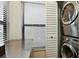 Functional laundry area with modern washer/dryer and utility counter at 3012 S Semoran Blvd # S, Orlando, FL 32822