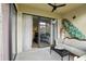 Relaxing outdoor patio with sliding glass doors, comfortable seating, and stylish decor at 3012 S Semoran Blvd # S, Orlando, FL 32822
