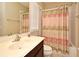 Bright bathroom featuring a shower/tub combo and a neutral color scheme at 312 Trieste Loop, Lake Mary, FL 32746
