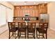 Stylish kitchen featuring a breakfast bar, stainless steel appliances, and ample cabinet space at 312 Trieste Loop, Lake Mary, FL 32746