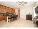 Spacious kitchen with granite countertops, a breakfast bar, and stainless steel appliances at 312 Trieste Loop, Lake Mary, FL 32746