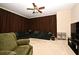 Large living room with comfortable seating, ceiling fan, and neutral color scheme at 312 Trieste Loop, Lake Mary, FL 32746