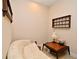 Small sitting room with decorative shelving and comfortable seating at 312 Trieste Loop, Lake Mary, FL 32746