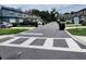 Street view showcases neat townhomes and community parking at 3248 Merton Aly, Orlando, FL 32808