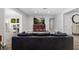 Comfortable living room with wood floors and a red accent cabinet at 3251 Wickersham Ct, Orlando, FL 32806