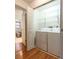 Dedicated laundry room includes shelving, a washer, a dryer, and vinyl floors at 342 Lakebreeze Cir, Lake Mary, FL 32746