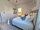 Comfortable bedroom with two twin beds, ceiling fan, and decor at 444 Halter Dr, Apopka, FL 32712