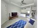 Open-concept space features a stylish living area and kitchenette complete with granite countertops, and stainless steel appliances at 444 Halter Dr, Apopka, FL 32712