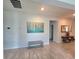 Living room featuring modern art and tile flooring at 444 Halter Dr, Apopka, FL 32712