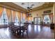 Spacious clubhouse with hardwood floors, large windows, and comfortable seating at 4833 Cypress Woods Dr # 4205, Orlando, FL 32811