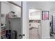 View into kitchen area from hallway with access to the pantry at 4833 Cypress Woods Dr # 4205, Orlando, FL 32811