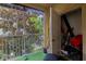 Relaxing screened patio featuring extra storage space and green turf flooring at 4833 Cypress Woods Dr # 4205, Orlando, FL 32811